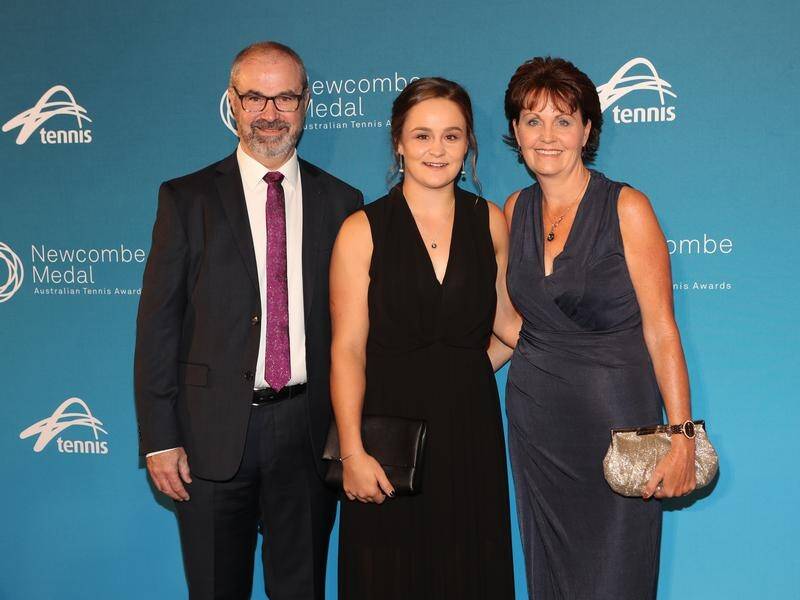 Ashleigh Barty, here with parents Robert and Josie, says family chats make her day.