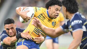 Waqa Blake is determined to absorb the pressure from Nathan Cleary's boot in the NRL grand final. (Scott Radford-Chisholm/AAP PHOTOS)