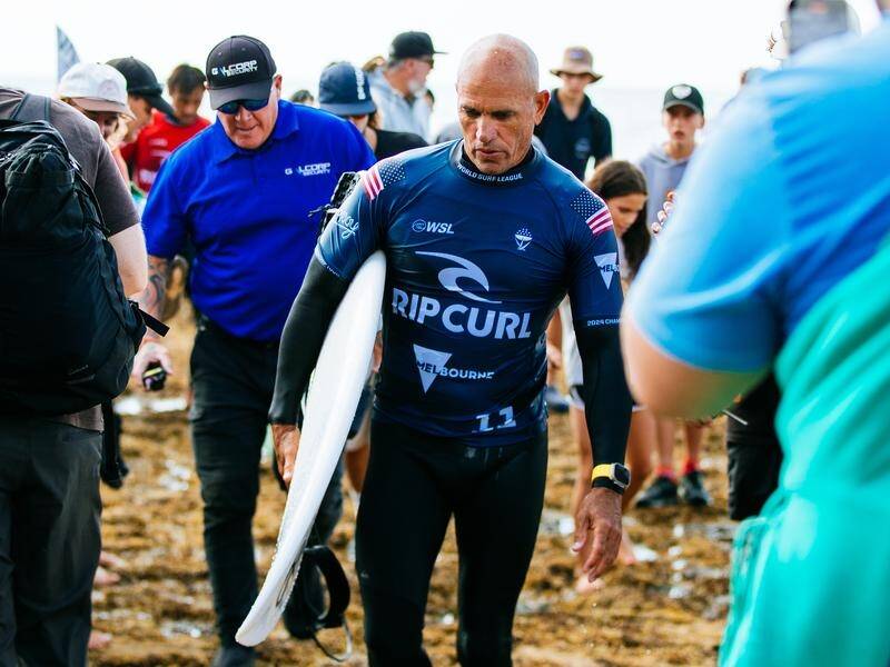 American veteran Kelly Slater leaves the beach after being eliminated at the Rip Curl Pro. (HANDOUT/WORLD SURF LEAGUE)