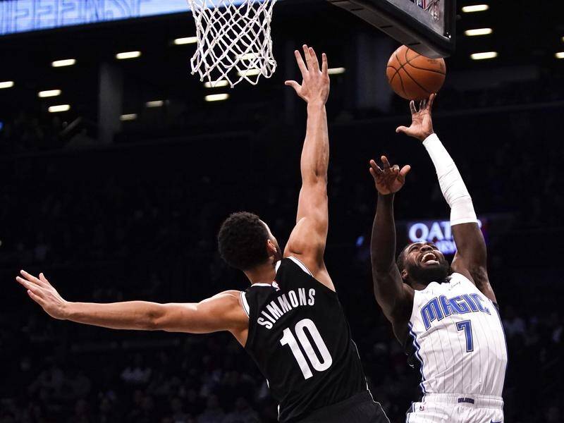Ben Simmons only lasted to the second quarter of the Nets' 109-102 home victory over Orlando Magic. (AP PHOTO)
