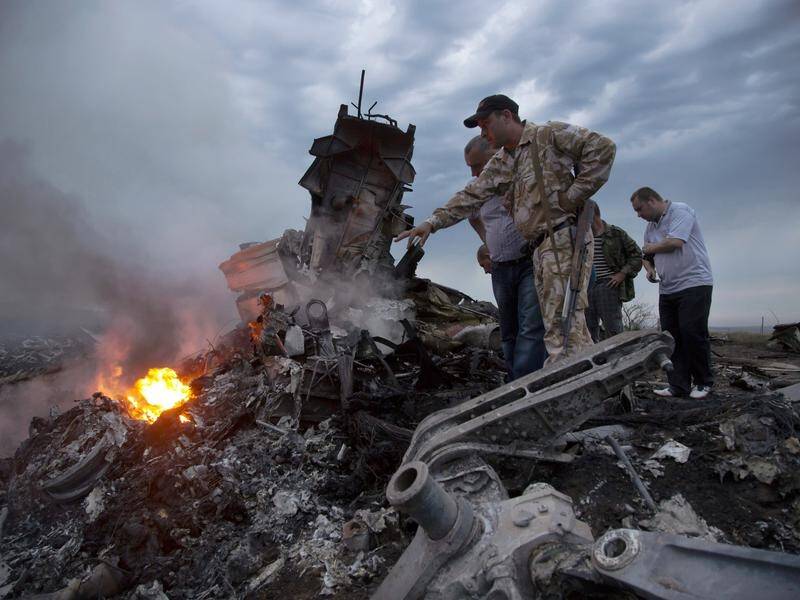Thirty-eight Australians were among those killed when MH17 was downed over Ukraine eight years ago. (AP PHOTO)