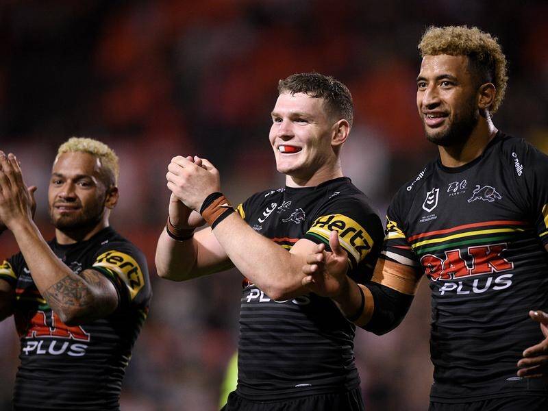 Penrith will be without Api Koroisau (l) and Viliame Kikau (r) in 2023, making their defence hard. (Dan Himbrechts/AAP PHOTOS)