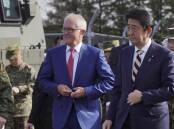 Former PM Malcolm Turnbull (L) will join Australia's delegation to Shinzo Abe's (R) funeral. (file) (AP PHOTO)