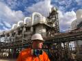 Mining giant BHP is using wind farms and solar to offset its carbon footprint. (Marion Rae/AAP PHOTOS)