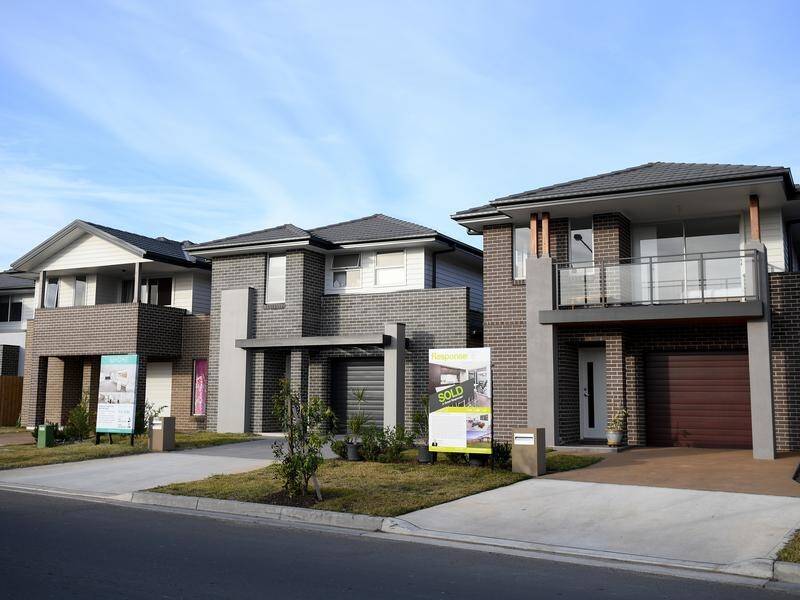 The decline in housing prices slowed in Sydney and Melbourne over September, one index shows. (Dan Himbrechts/AAP PHOTOS)