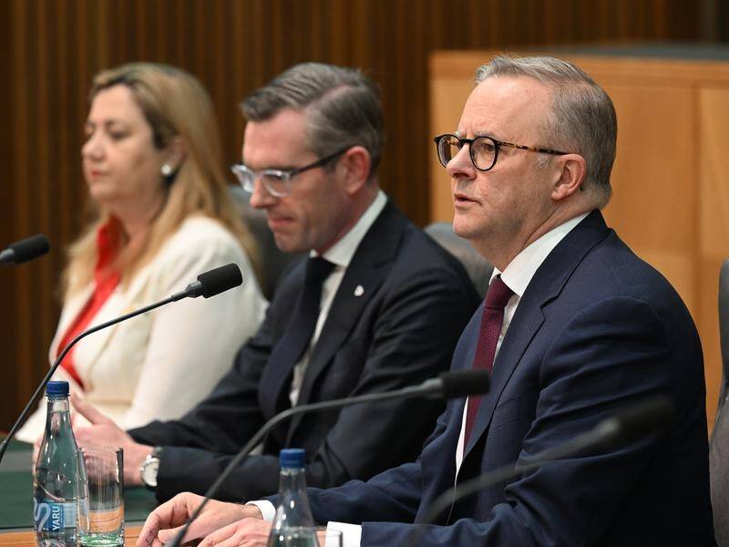 Not everyone is sure about national cabinet's decision to scrap mandatory isolation requirements. (Mick Tsikas/AAP PHOTOS)