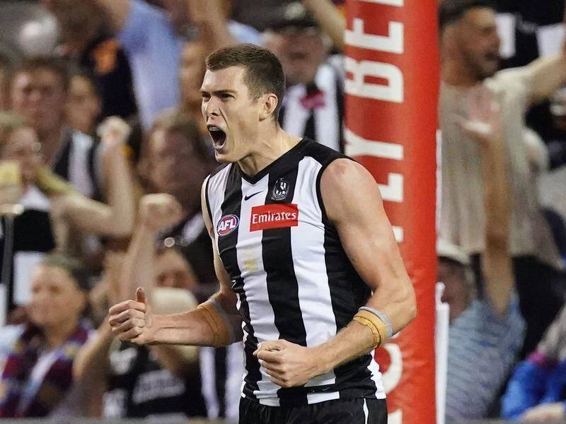 Mason Cox has been recalled to the Collingwood line-up for the AFL clash against Fremantle.