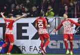 Freiburg's Lucas Holer (r) celebrates after scoring a late equaliser against Bayern Munich. (AP PHOTO)