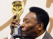 Pele's family say he is in hospital for a respiratory infection and is not close to death. (AP PHOTO)