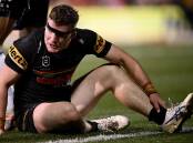 Liam Martin's ankle injury, suffered in Penrith's loss to Melbourne, isn't as bad a first feared. (Dan Himbrechts/AAP PHOTOS)