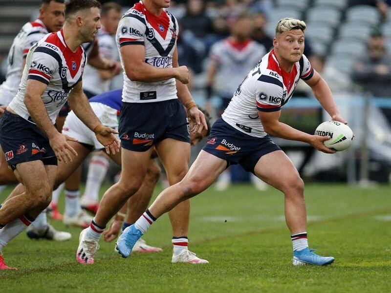 Lachlan Lam will start at halfback for the Roosters against the Storm, says coach Trent Robinson.