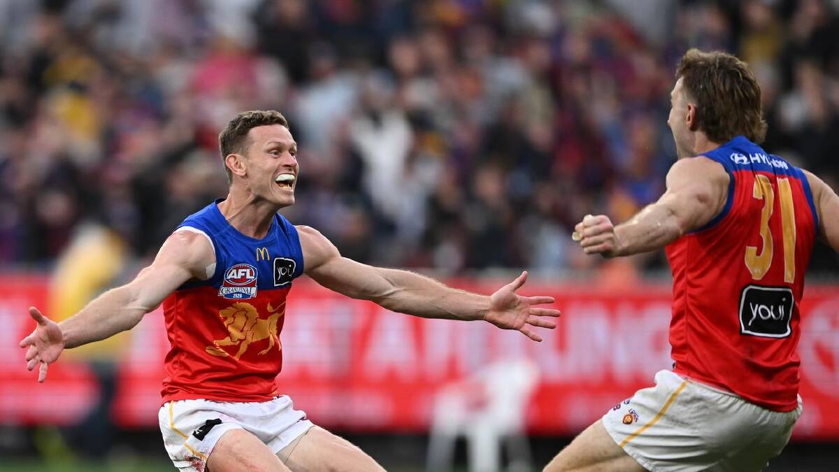 Lester (left) celebrates with Harris Andrews after winning the AFL grand final. (James Ross/AAP PHOTOS) Lester (left) celebrates with Harris Andrews after winning the AFL grand final. (James Ross/AAP PHOTOS)