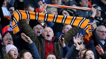 A playoffs loss means Luton fans will to cheer their team on in the Championship for another season.