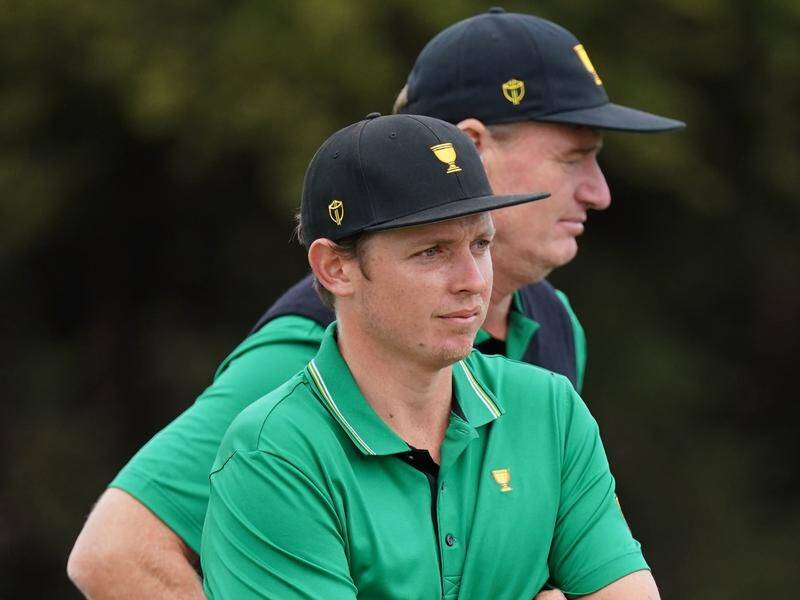 Australian golfer Cameron Smith is happy with his Presidents Cup debut despite sharing the points.