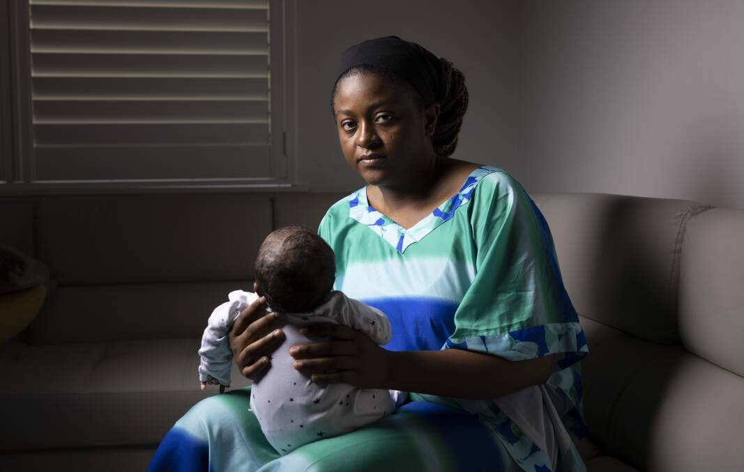 Linda Esenwozu and her baby. Picture by Keegan Carroll