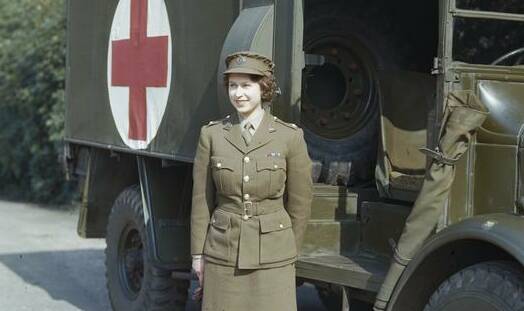 Princess Elizabeth, a 2nd Subaltern in the ATS standing in front of an ambulance. Picture: Imperial War Museum