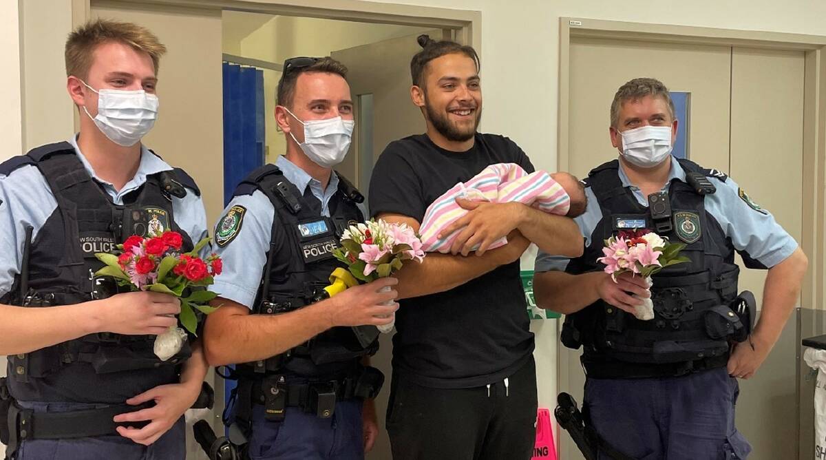 Officers distributed the flowers at Quenbeyan hospital. Picture Queanbeyan police via Facebook