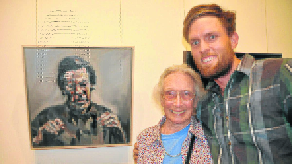 BIGGEST FAN: Helen Ferguson with grandson Nick Ferguson and his painting, which won first prize in the section. 