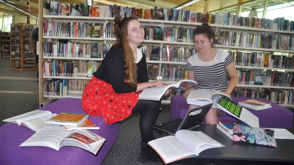 FINAL SPRINT:  St Catherine’s Catholic College, Singleton, students Naomi Moriarty (left)  and Kellie Flinn at Singleton library studying for the HSC exams which begin next week.