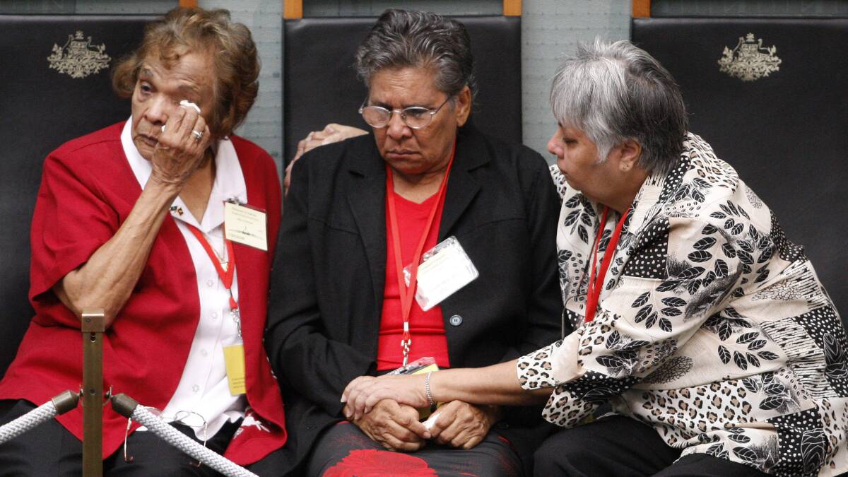 Members of Australia's Stolen Generation react in Parliament as they listen to then Prime Minister Kevin Rudd deliver the National Apology to the Stolen Generations in 2008. Picture: Getty Images