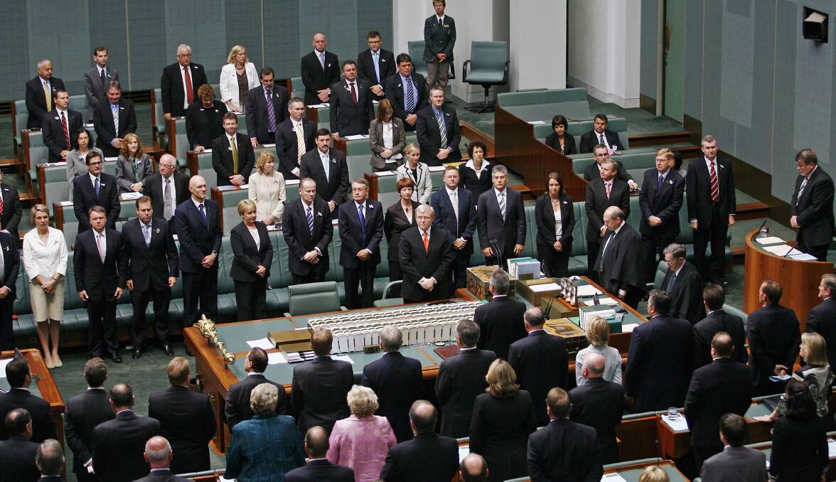 Prime Minister Kevin Rudd leads a minute's silence on February 13, 2008, after delivering an Apology to the Aboriginal people for injustices committed over two centuries of white settlement. Picture: Getty Images