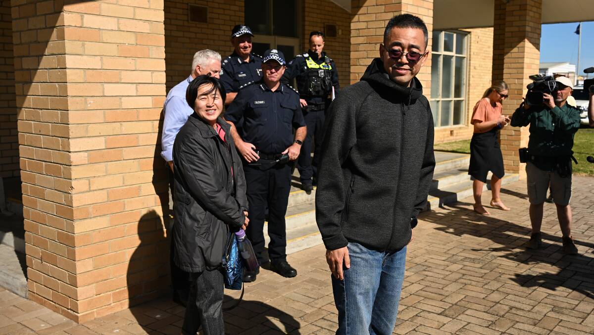 Jack Shi (right), father of one of the discovered teenagers, said it was a huge relief they had been found on December 20, 2022. Picture by James Ross/AAP