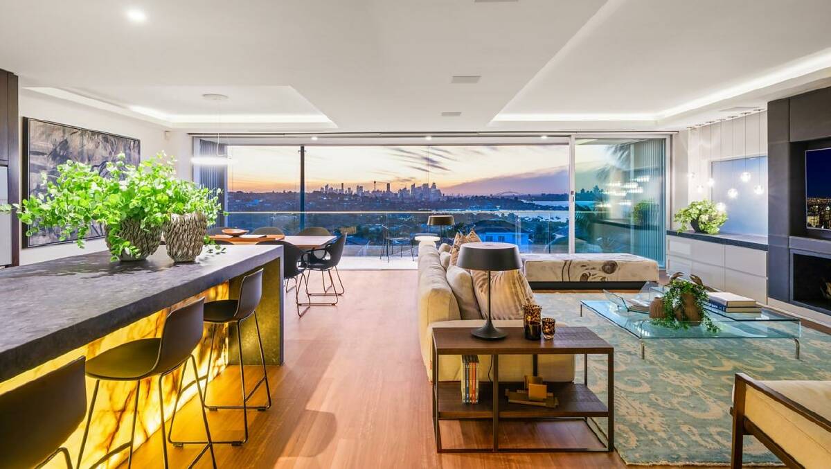 The open plan home has view across Sydney. Pictures by Sotheby's International Realty