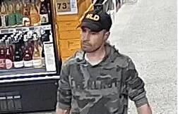 Police are keen to speak to this man, who may be able to assist with their enquiries into the theft of $18,000 of alcohol from bottle shops. Picture by Victoria Police