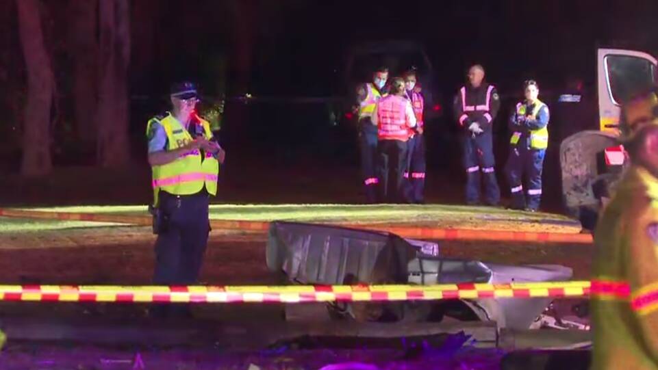 Police at the scene of an horrific car crash in Buxton, in southwest Sydney, on Tuesday, September 6. Picture by Channel 9 