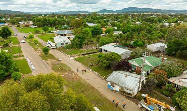 Homes were swept along the street by floodwaters in Eugowra in November 2022. Picture by Farmpix Photography