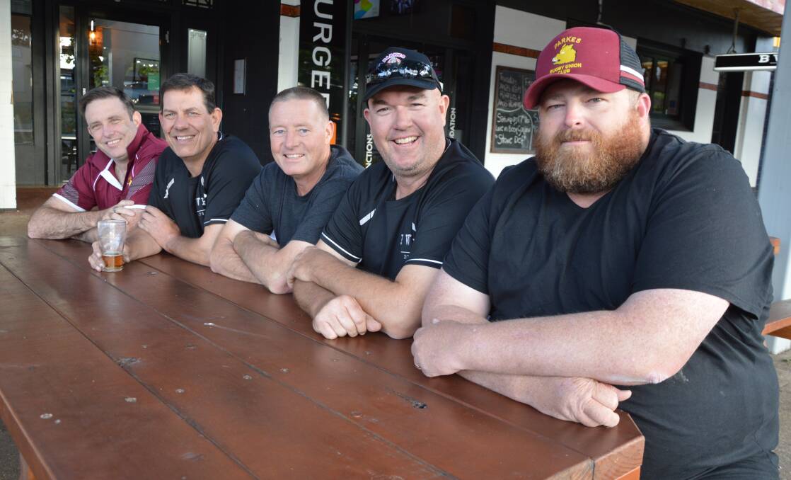 How Scott Morrissey, Wayne Osborne, Craig Rusten, Richard Rice and Chris Summerhayes from the Parkes Rugby Union Club look these days without the star-studded Elvis jumpsuits and wigs that made them famous. Picture by Christine Little
