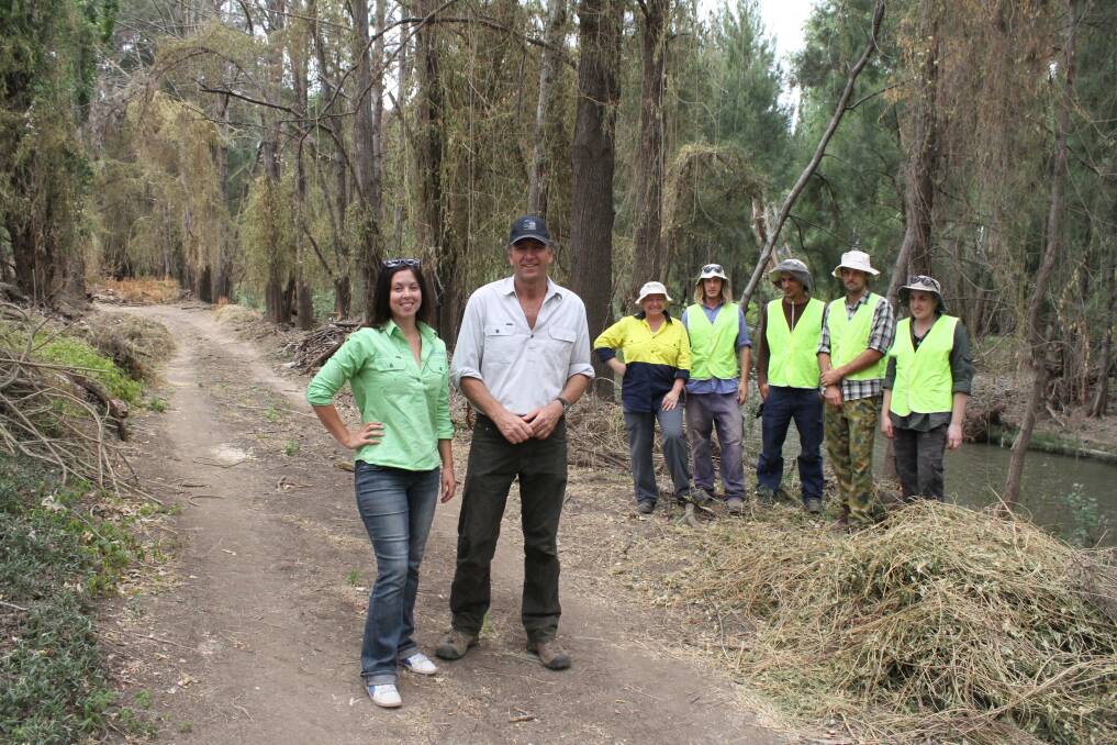 MAKING PATHWAYS: Great Eastern Ranges Stepping Stones project facilitator Kirsten McKimmie and Two Rivers Wines owner Brett Keeping with members of Conservation Volunteers Australia team, who have been clearing passages to make the Hunter River on the Denman property more accessible, Sandy Benson, Lewis McPherson, Asher Mooney, Shawn Ryan, Rohanna Teiwsen.
