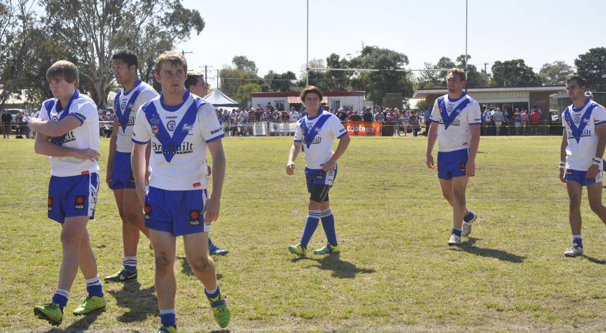  DEJECTED WARRIORS: Despondent Scone under-18 players after suffering a 42-18 loss to the Muswellbrook Rams.