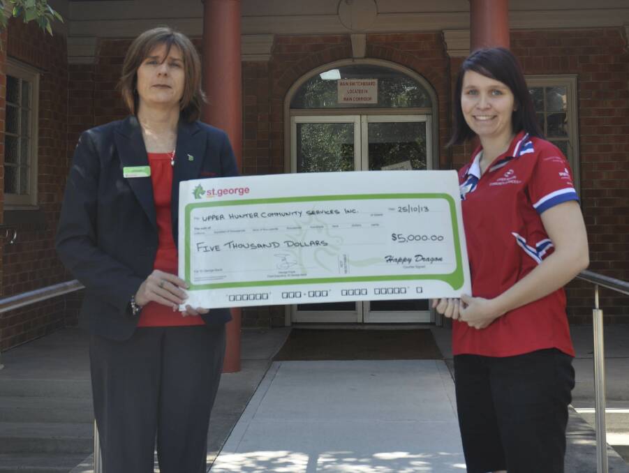 IN THE MONEY: Muswellbrook St George bank manager Lea Pharoah recently presented Upper Hunter Community Services youth development officer Esther Mines with a cheque for $5000, thanks to the St George Start Something Local Grant.